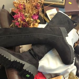 Black platform over the knee boots